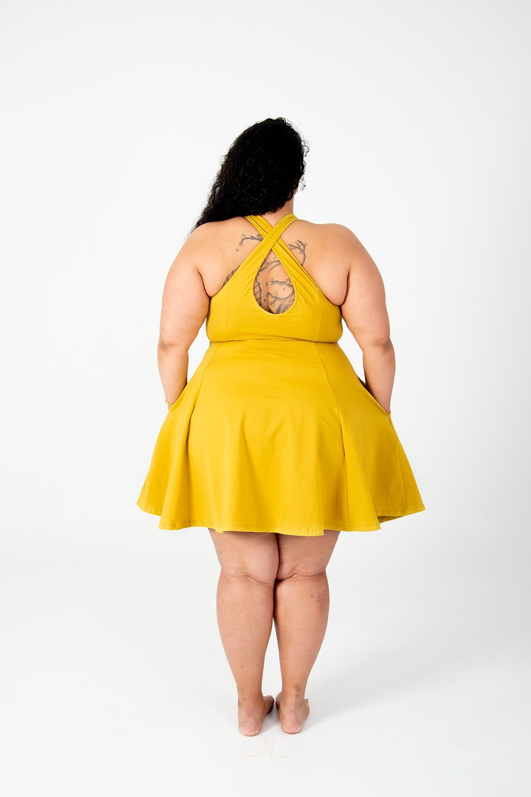 Asri Cross Back Mini Dress In Mustard Seed