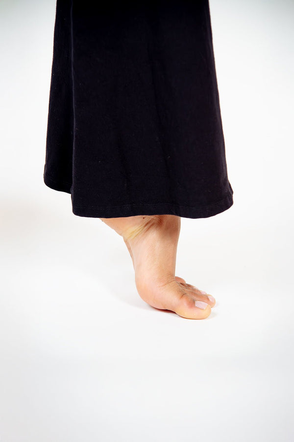 Faiza Flare Trousers Petite in Black - Manners London