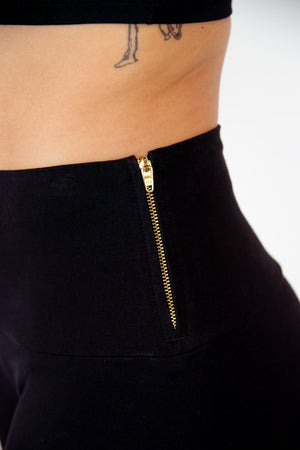 Faiza Flare Trousers Petite in Black - Manners London