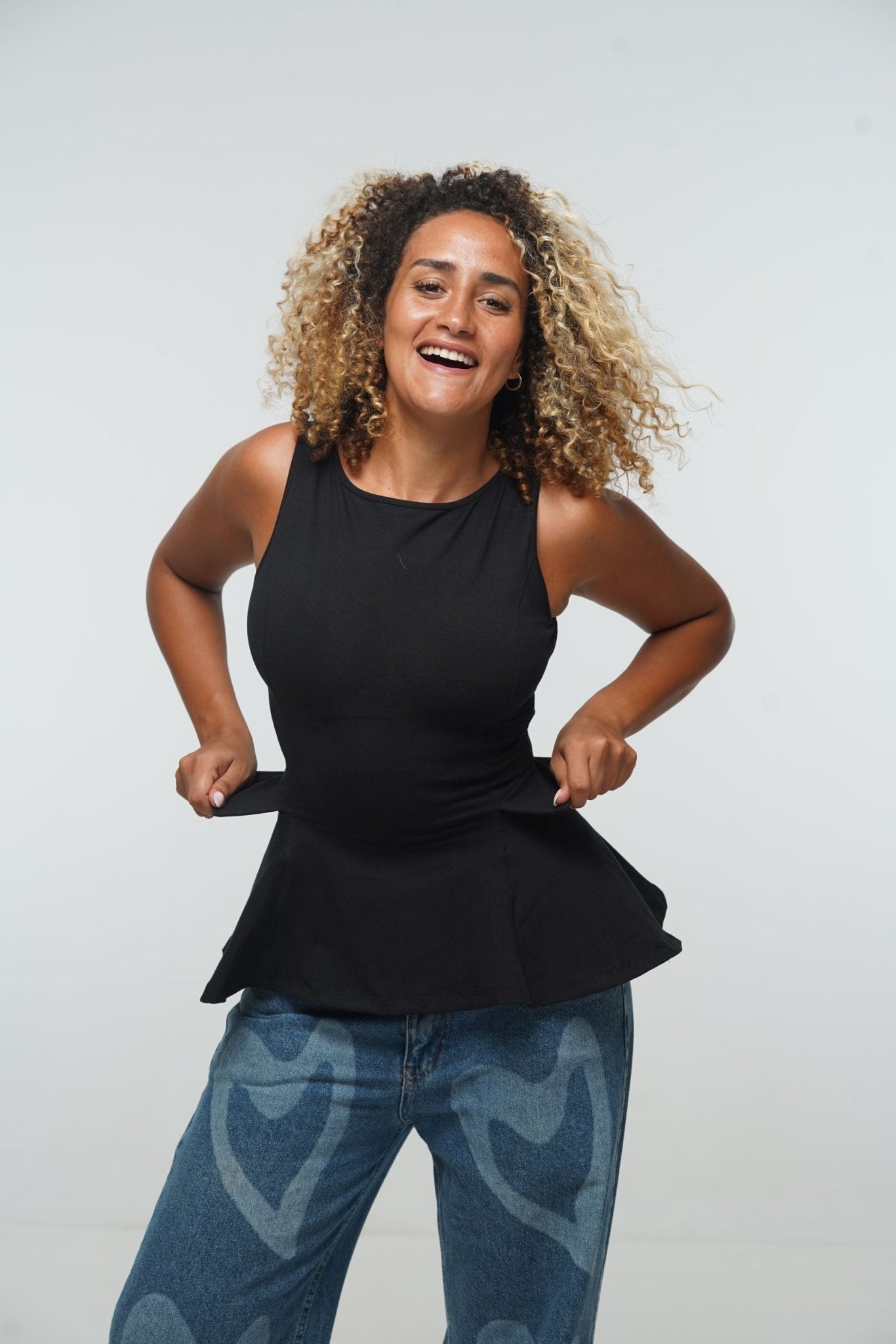 Peplum Boat Neck top With Pockets in Black