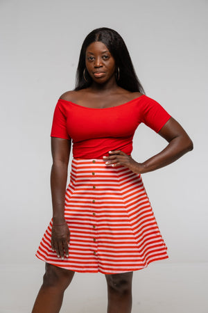 Popper Skirt Mini in Tomato Red on Bubblegum pink!  - Manners London