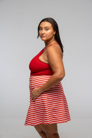 Popper Skirt Mini in Tomato Red on Bubblegum pink!  - Manners London