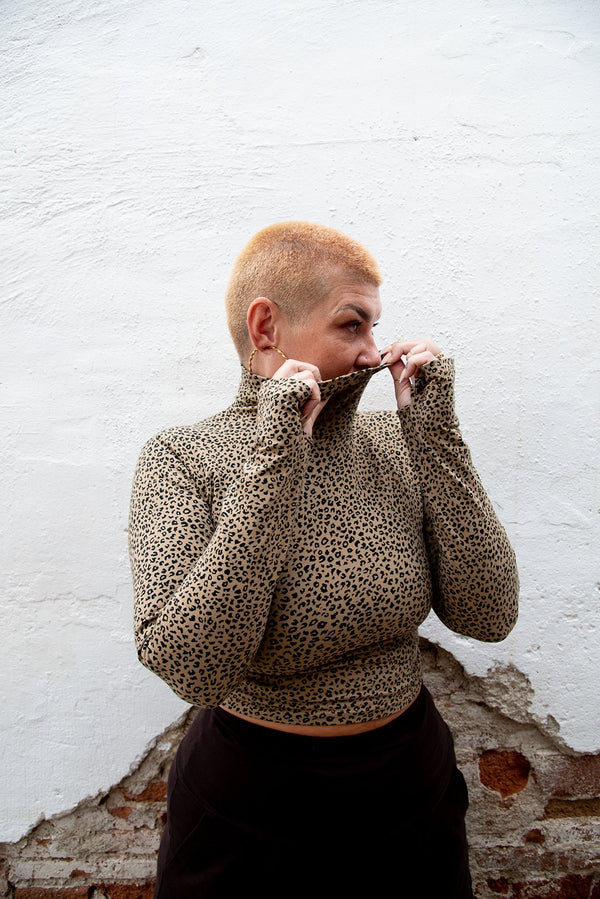 Turtle Neck Long Sleeve Crop Top with Hole in Classic Leopard - Manners London