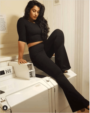 Faiza Flare Trousers in Black - Manners London