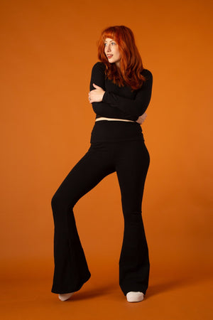 Faiza Flare Trousers in Black - Manners London