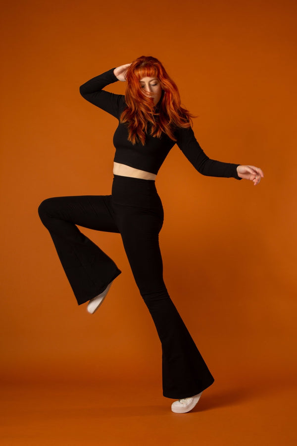 Faiza Flare Trousers in Black - Manners London